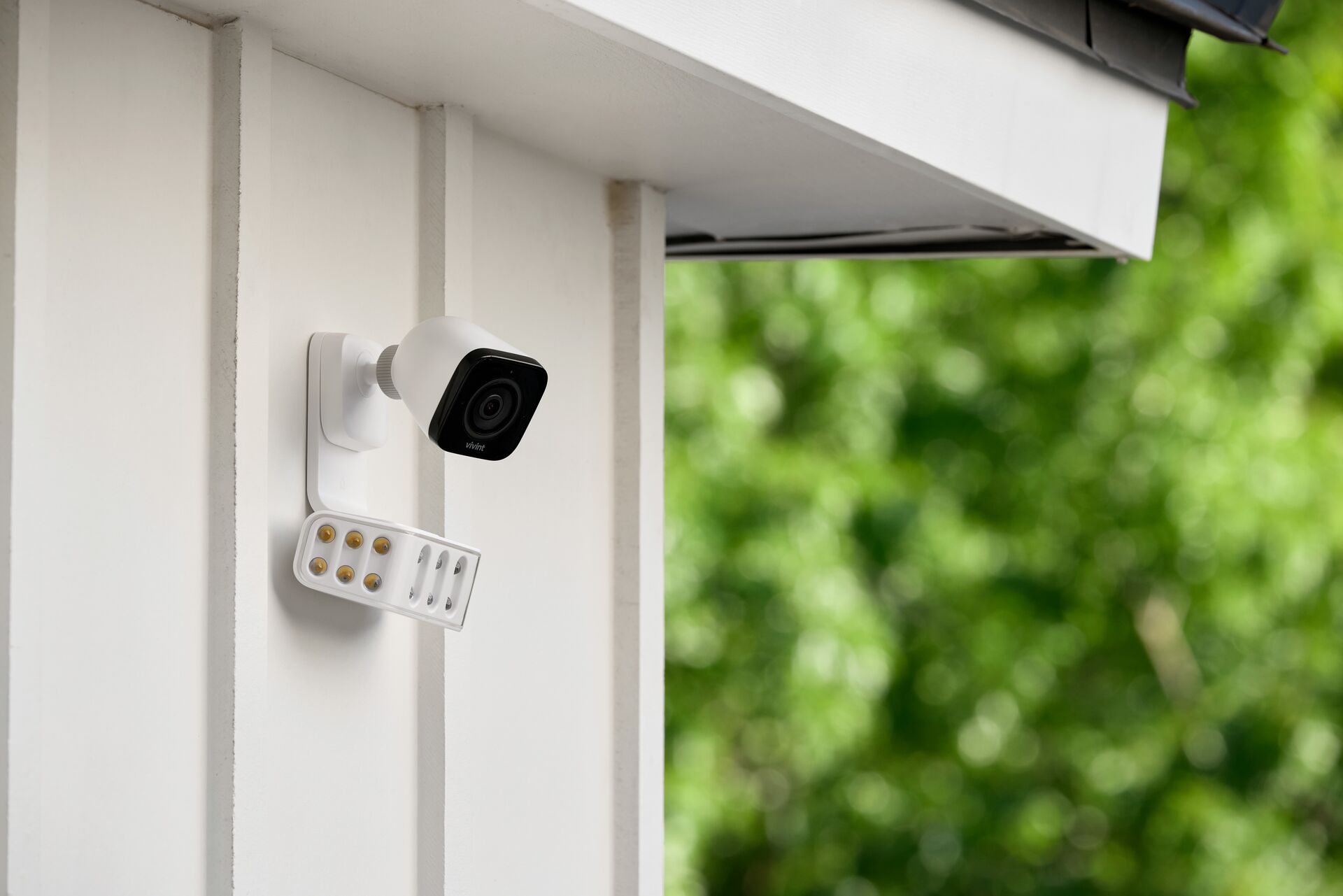 Articulated indoor and outdoor wall mounted smart security camera