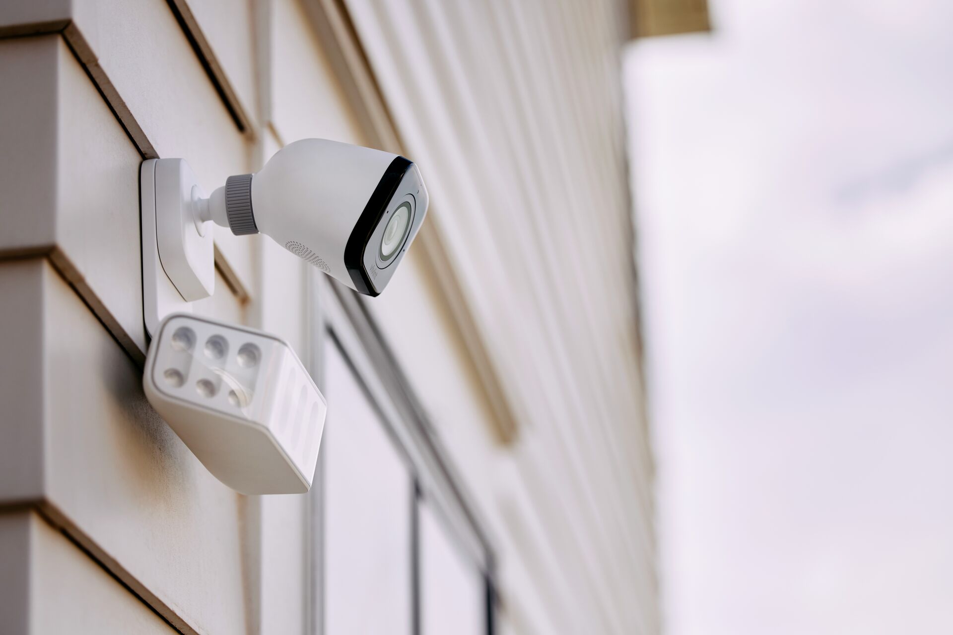 Outdoor spotlight camera with ultra-bright perimeter deterrence